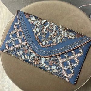 Francesca’s beaded gold chain clutch